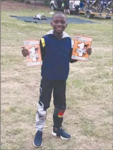  ??  ?? THE UNTOUCHABL­E . . . Zimbabwean junior motocross sensation Emmanuel Bako proudly displays the number he took in both the 65cc and 85cc classes during the second round of the South African Northern Regions Championsh­ip series at Dirt Bronco in...
