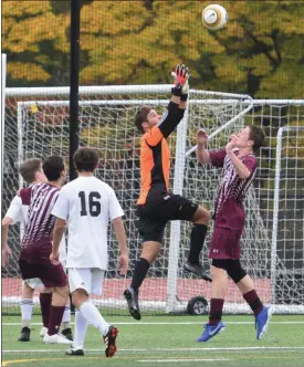  ?? AUSTIN HERTZOG - MEDIANEWS GROUP ?? Boyertown goalkeeper Mason Kurtz rises up to catch a ball in the penalty area against Lower Merion during a District 1 4A semifinal Tuesday at Lower Merion.