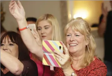  ??  ?? Pauline O’Connor captures some of the action at Lip Sync Battle in the Royal Hotel in aid of the Dementia Garden for Loughlinst­own Hospital.