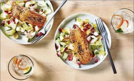  ?? GOLDBERG/ FOR THE WASHINGTON POST FOOD STYLING BY LISA CHERKASKY. STACY ZARIN ?? Honey Mustard Glazed Salmon With Endive and Green Apple Salad makes a light, high-protein dinner.