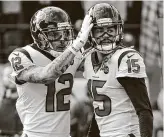  ?? Brett Coomer / Staff photograph­er ?? Newcomer Brandin Cooks, left, will join Kenny Stills and Will Fuller (15) to give the Texans one of the fastest wide receiver units in the NFL.