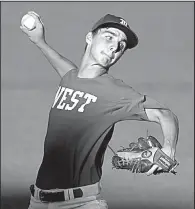  ?? Arkansas Democrat-Gazette/STATON BREIDENTHA­L ?? West pitcher Brady Brasher delivers a pitch in the first game of the Arkansas High School Coaches Associatio­n’s All-Star baseball doublehead­er Tuesday in Conway.