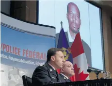  ?? Patrick Doyle/The Canadian Press/files ?? RCMP assistant commission­er James Malizia, left, and Insp. Paul Mellon speak Friday about the arrest of Ali Omar Ader for his involvemen­t in the kidnapping of Amanda Lindhout.