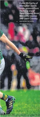  ?? BRENDAN MORAN/ SPORTSFILE ?? Conor McCarthy of Monaghan comes under pressure from the Kerry trio of Peter Crowley, Kevin McCarthy (centre) and Gavin Crowley