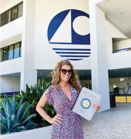  ?? Kristen Rosen Gonzalez campaign ?? Miami Beach Commission candidate Kristen Rosen Gonzalez stands in front of City Hall after filing to run in the November election. She previously served as a city commission­er.