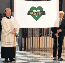  ??  ?? A banner of the ’Grenfell Heart’ was taken into St Paul’s Cathedral