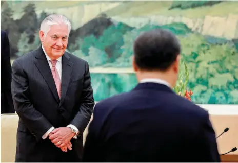  ?? AFP ?? US secretary of state Rex Tillerson met the Chinese president Xi Jinping, right, on Saturday in Beijing to discuss North Korea