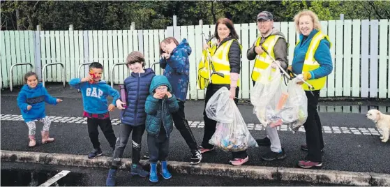  ??  ?? Residents of Doorly Park and Martin Savage Terrace doing a clean-up of the Doorly Park area.