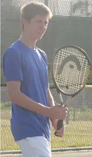  ?? Smith, SDN) (Photo by Danny P. ?? Nathan Pollan of Starkville Academy gets some practice time in on the tennis court following Thursday's match against Oak Hill Academy.