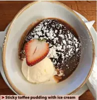  ?? ?? > Sticky toffee pudding with ice cream