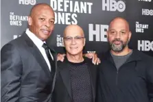  ?? | MICHAEL LOCCISANO/ GETTY IMAGES ?? Dr. Dre ( left) and Jimmy Iovine are the subjects of “The Defiant Ones,” a documentar­y by Allen Hughes ( right).