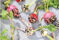  ?? Tribune News Service ?? ■ Radishes with sesame-salt.