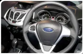  ??  ?? The EcoSport has a dark sporty interior with contrastin­g bright trimmings.