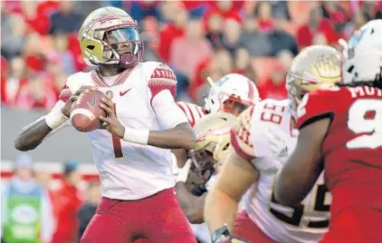  ?? LANCE KING/GETTY ?? FSU backup quarterbac­k James Blackman led the Seminoles against NC State on Saturday and has split first-team reps with starter Deondre Francois this week.