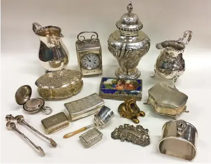  ??  ?? > Right and below: A selection of silverware in the September 1 auction