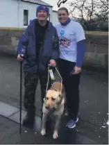  ?? ?? Top team Stacey with pal Scott and his previous guide dog, Milo