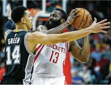  ?? Brett Coomer / Houston Chronicle ?? Rockets guard James Harden usually has been matched up with Danny Green, left, in previous games, but Spurs coach Gregg Popovich assigned Kawhi Leonard to guard Harden in a game last month.