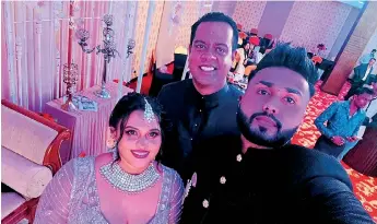  ?? ?? THE FINAL FRAME: Sanath Nishantha posing with his nephew and bride at Wednesday’s wedding in Chilaw before saying farewell and heading off on his ill-fated journey to Colombo