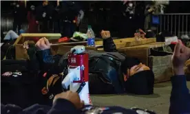  ?? Photograph: Dominic Gwinn/Zuma Wire/Rex/ Shuttersto­ck ?? Climate activists stage a die-in near Mayor Lori Lightfoot’s home to protest a metal recycling plant on the Southeast Side on Thursday.