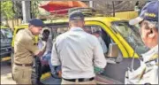  ?? PRATIK CHORGE/HT PHOTO ?? Traffic police inspect vehicles as part of a drive to enforce compulsory seat belt order.