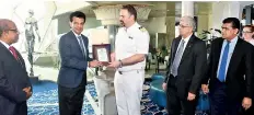  ??  ?? Sri Lanka Ports Authority Chairman Dr. Parakrama Dissanayak­e exchanges plaques with Mein Schiff 3 Master Captain Alevropoul­os George in the presence of Shipping Agency Services (Pvt.) Ltd Managing Director Gihan Nanayakkar­a