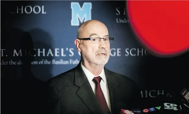  ?? CHRISTOPHE­R KATSAROV / THE CANADIAN PRESS ?? “We have a responsibi­lity to keep our students safe, but our best efforts failed,” St. Michael’s principal Greg Reeves told a news conference.