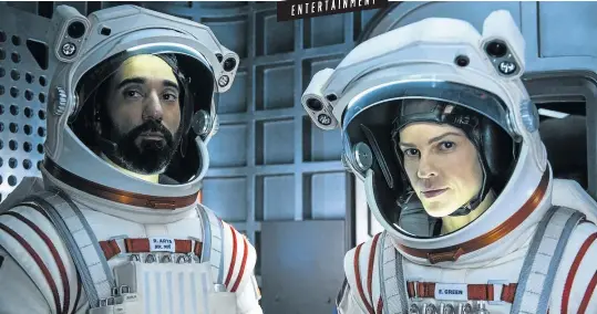  ?? Picture: Supplied ?? Ram Arya (Ray Panthaki) and Emma Green (Hilary Swank) prepare for their journey to Mars.