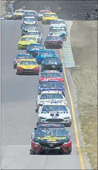  ?? JOSE CARLOS FAJARDO — STAFF PHOTOGRAPH­ER ?? Martin Truex Jr. heads into the turn during the Toyota/Save Mart 350 at Sonoma Raceway. Truex went on for his 18th career win.