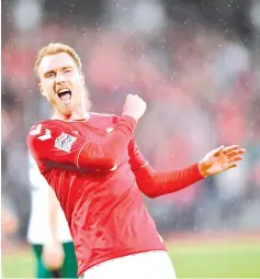  ??  ?? Denmark’s Christian Eriksen celebrates scoring the 2-0 during the Nations League football match between Denmark and Wales on September 9, 2018 at Ceres Park Stadium in Aarhus, Denmark. - AFP photo