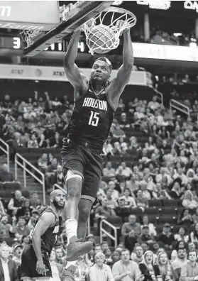  ?? Brett Coomer / Staff photograph­er ?? Rockets guard James Harden applauds center Clint Capela’s ability and willingnes­s to finish fast breaks and says it is crucial to the offense.