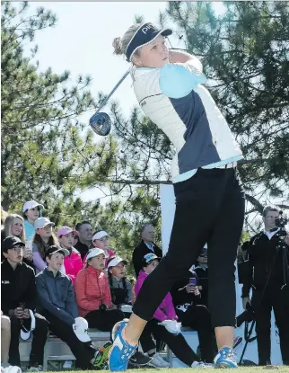  ?? PHOTOS: JULIE OLIVER ?? LPGA Tour player Brooke Henderson of Smiths Falls was at Eagle Creek Golf Club in Dunrobin on Tuesday with her sister and caddy, Brittany Henderson, giving a clinic for junior golfers.