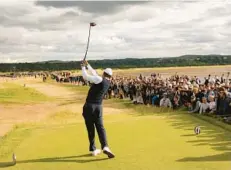  ?? GERALD HERBERT/AP ?? Tiger Woods is in danger of missing the cut after shooting a 6-over 78 in the opening round of the British Open on Thursday.