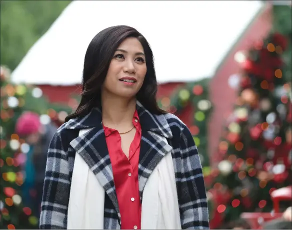  ?? ?? Liza Lapira in “Must Love Christmas”