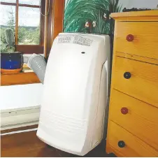  ??  ?? Portable air conditione­rs are typically vented through a window.