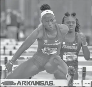 ?? CRANT OSBORNE/NATE Allen Sports Service ?? Arkansas sophomore Janeek Brown competes in the hurdles earlier this season. Brown is one of 10 semifinali­st for The Bowerman award.