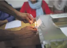  ?? AP ?? A ballot box is opened yesterday to start counting at a polling station in Diyarbakir, south-eastern Turkey