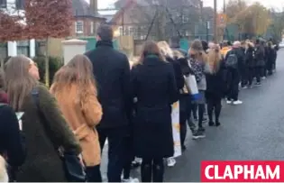  ??  ?? Can you see the door yet? Voters queue patiently in south London