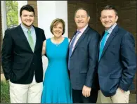  ?? (Special to the Democrat-Gazette) ?? Lesley and Tony Cooper, pictured with their sons Brett (left) and Cory (right), didn’t fall in love at first sight. One of their earliest encounters involved him asking her to pass a note to one of his girlfriend­s in class. But she reckoned before their first date that she might marry him one day — and she did, about two years later. “I couldn’t wait to get down the aisle and marry him,” she says.