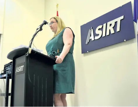  ?? BRYAN PASSIFIUME/POSTMEDIA NETWORK ?? Susan Hughson, executive director of the Alberta Serious Incident Response Team, speaks to the media in Calgary, Alta., on Thursday, about on the Jan. 2016 death of 53-year-old David McQueen, who was shot and killed by police after an armed standoff.