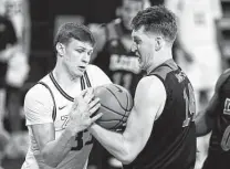  ?? Young Kwak / Associated Press ?? Gonzaga forward Ben Gregg, left, and the Zags will participat­e in a conference tournament unlike those in years past.