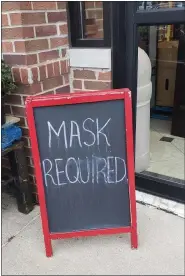 ?? JESSICA MCLEAN — MEDIANEWS GROUP ?? A sign requiring masks at Milford Grocery is pictured.