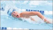  ?? Scott Herpst ?? Catoosa Great White Shark swimmer Callahan Tweed powers through the water during a race at the GRPA state meet in Fort Oglethorpe last weekend.