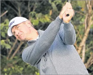  ?? AP PHOTO ?? In this Oct. 20 file photo, Lucas Glover watches his shot on the eighth hole during the second round of the CJ Cup golf tournament at Nine Bridges on Jeju Island, South Korea.