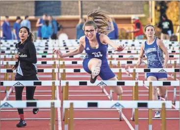  ??  ?? Ringgold’s Annabelle Duckett clears a hurdle during a meet in Calhoun early last week. The Lady Tigers placed fourth in the Calhoun meet and seventh at the Mohawk Invitation­al at Gordon Central this past Saturday. (Photo by Steve Bemis)