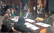  ?? via Georgia Health News ?? Brannen Whirledge appears at a Georgia House Insurance Committee hearing with his parents.