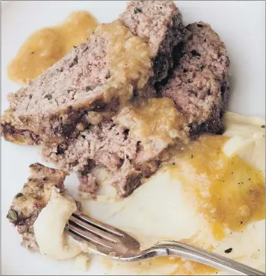  ??  ?? 1770 House Meatloaf is served with a garlic sauce by its namesake restaurant, 1770 House in East Hampton, N. Y.