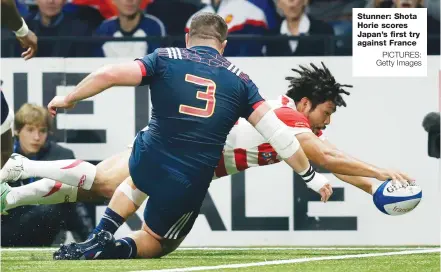  ?? PICTURES: Getty Images ?? Stunner: Shota Horie scores Japan’s first try against France