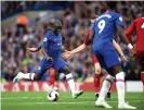  ??  ?? N’Golo Kanté drives past Liverpool’s defence to score for Chelsea late in the second half. Photograph: Darren Walsh/Chelsea FC via Getty Images