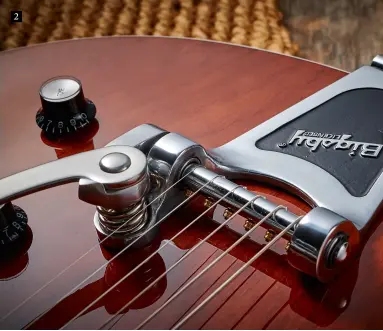  ??  ?? 2. This roller saddle tune-o-matic, along with a well-cut Graph Tech Tusq XL nut, ensures that the Bigsby vibrato is smooth in action and stays in tune 2