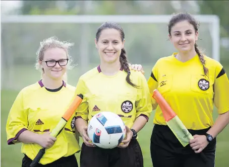  ?? DAX MELMER ?? Pictured from left are assistant referee Bridgette Gignac, referee Teodora Glisic and assistant referee Tina Selwan.